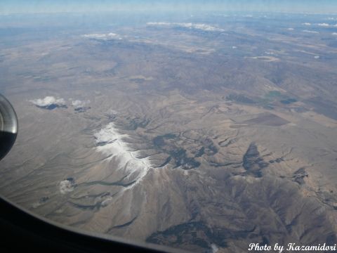 機窓の山と冠雪